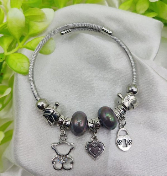 Pandora Charm Bracelet With Elegant Pearl Accents And Cute Charms